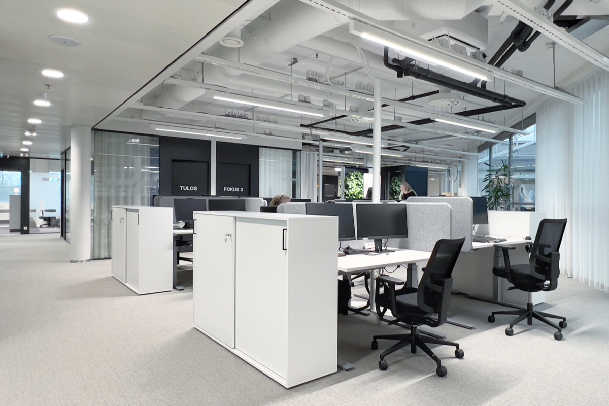 A photograph of an open-plan work space, designed for Figure by Itu Design