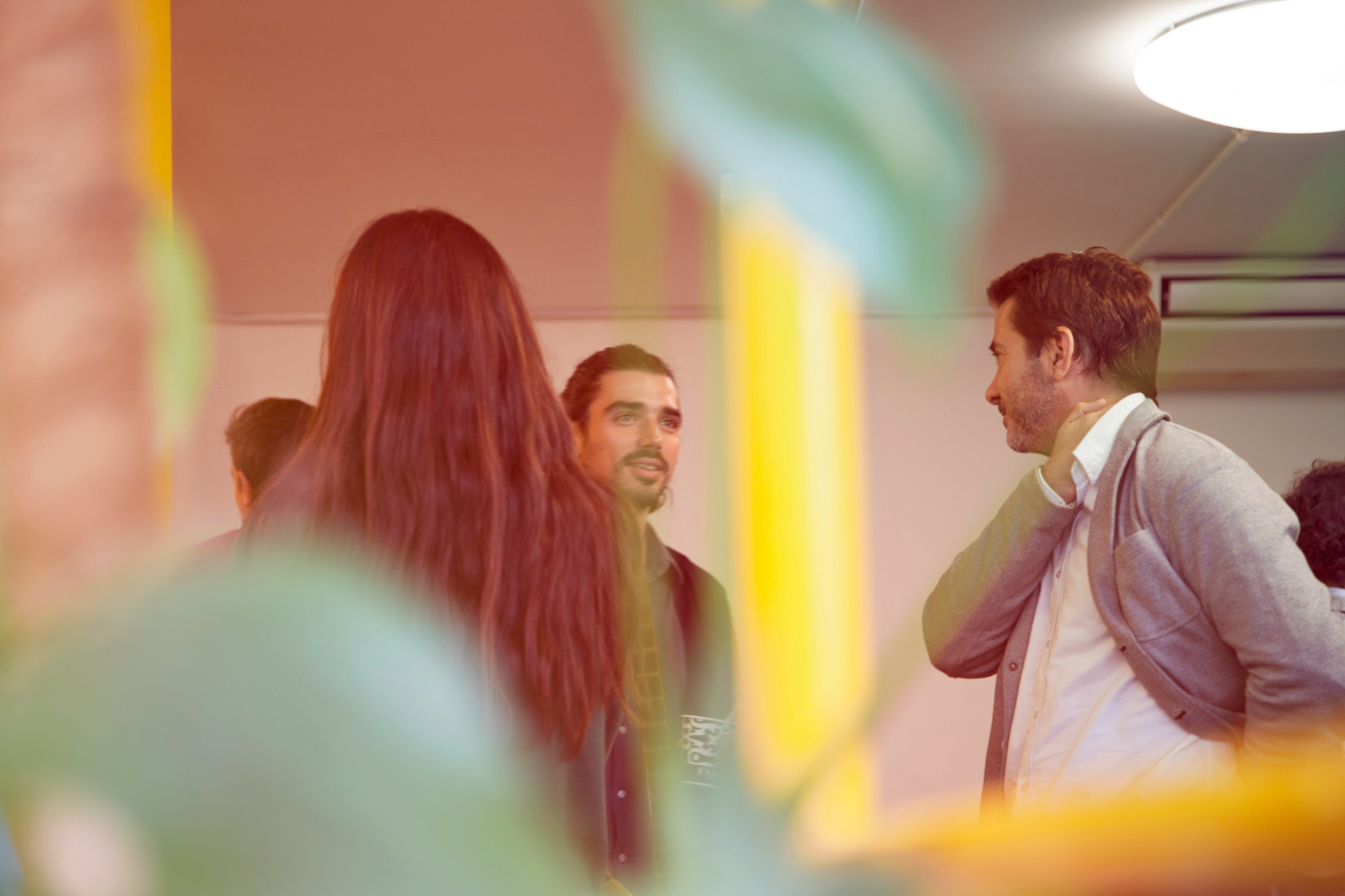 Photo of office workers enjoying an ad hoc discussion