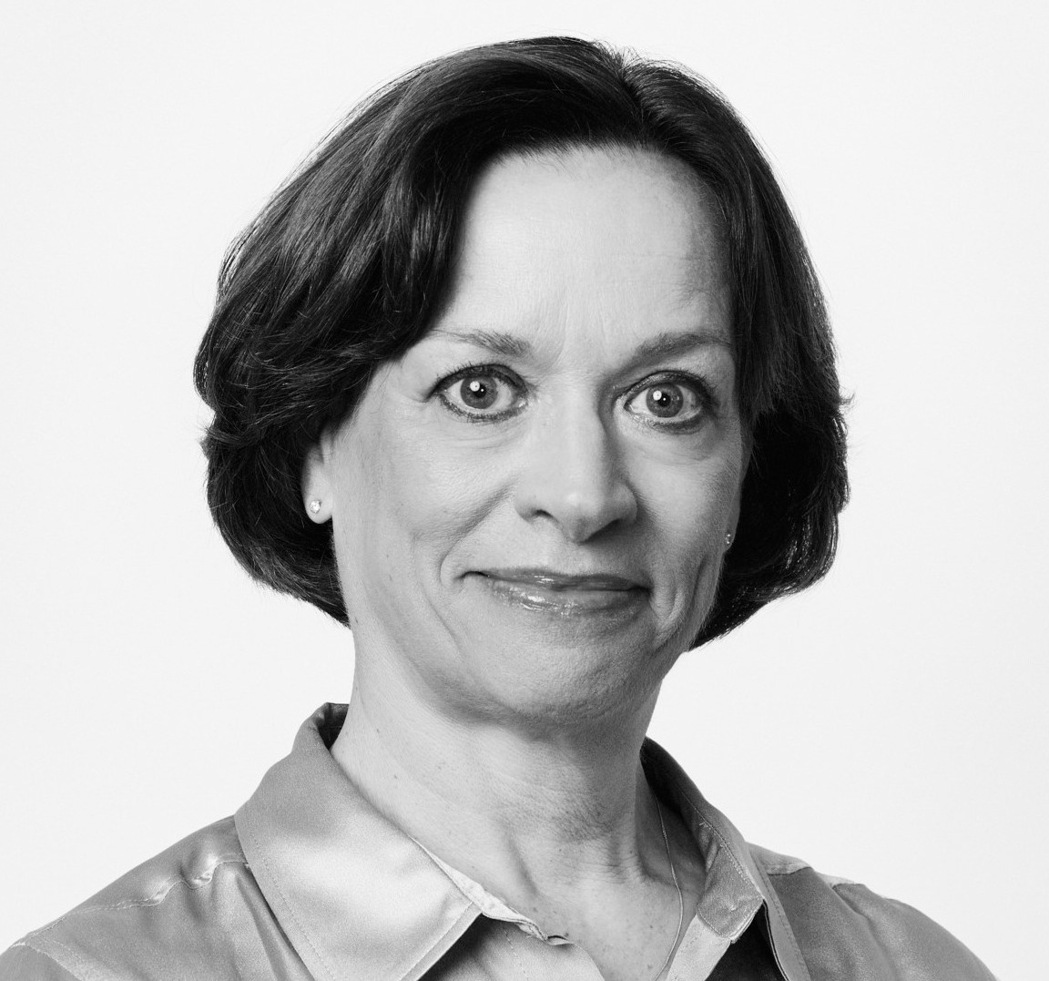 A photograph of Martina Andersin smiling to the camera